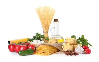 Photo of Different types of pasta and ingredients isolated on white