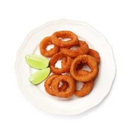Photo of Fried squid rings and lime isolated on white, top view