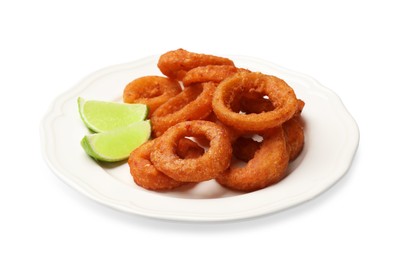 Photo of Fried squid rings and lime isolated on white