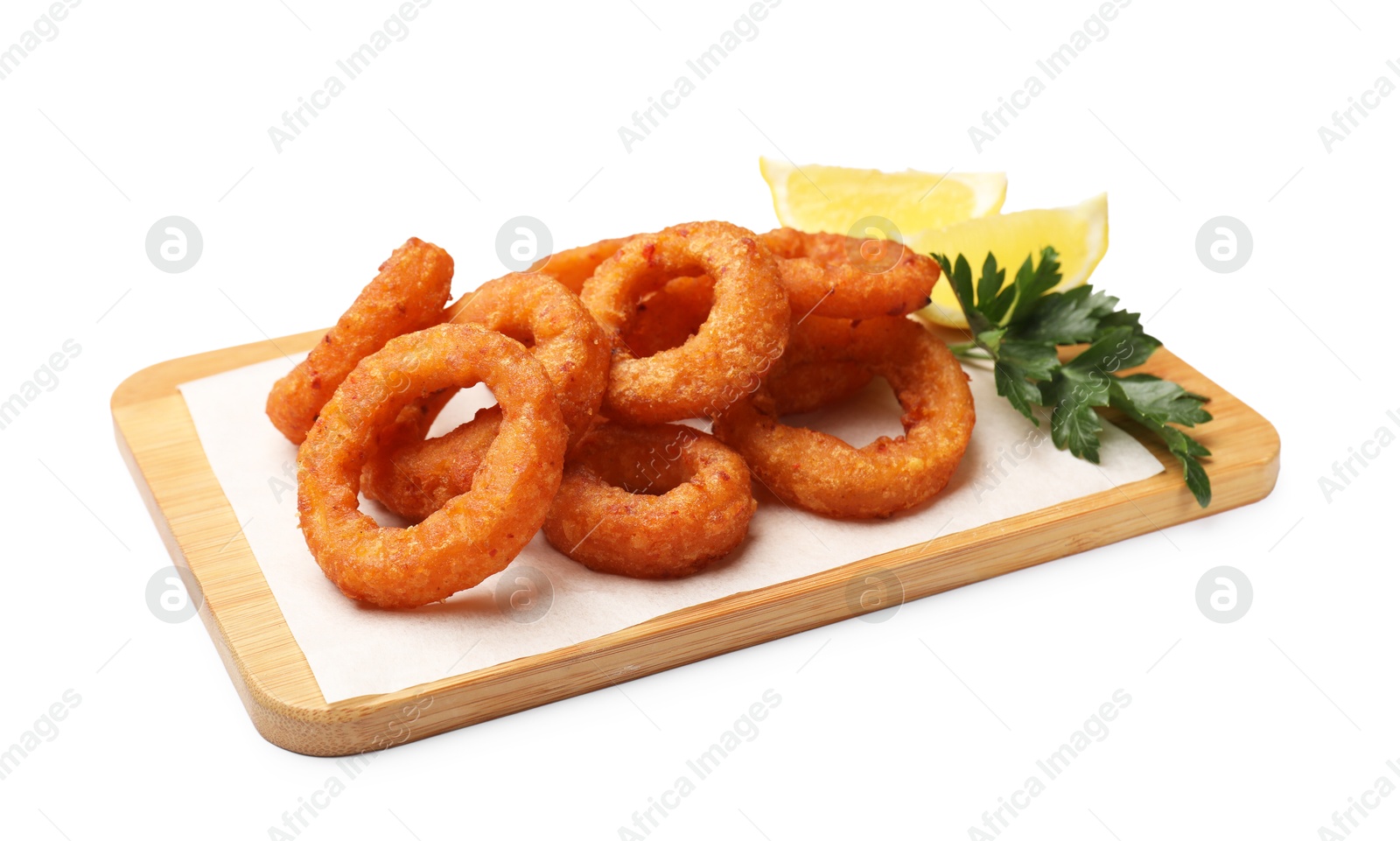 Fried squid rings with parsley and lemon isolated on white Photo of Fried squid rings with parsley and lemon isolated on white