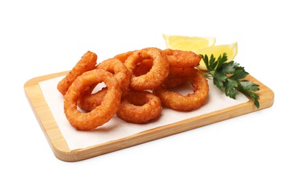 Photo of Fried squid rings with parsley and lemon isolated on white