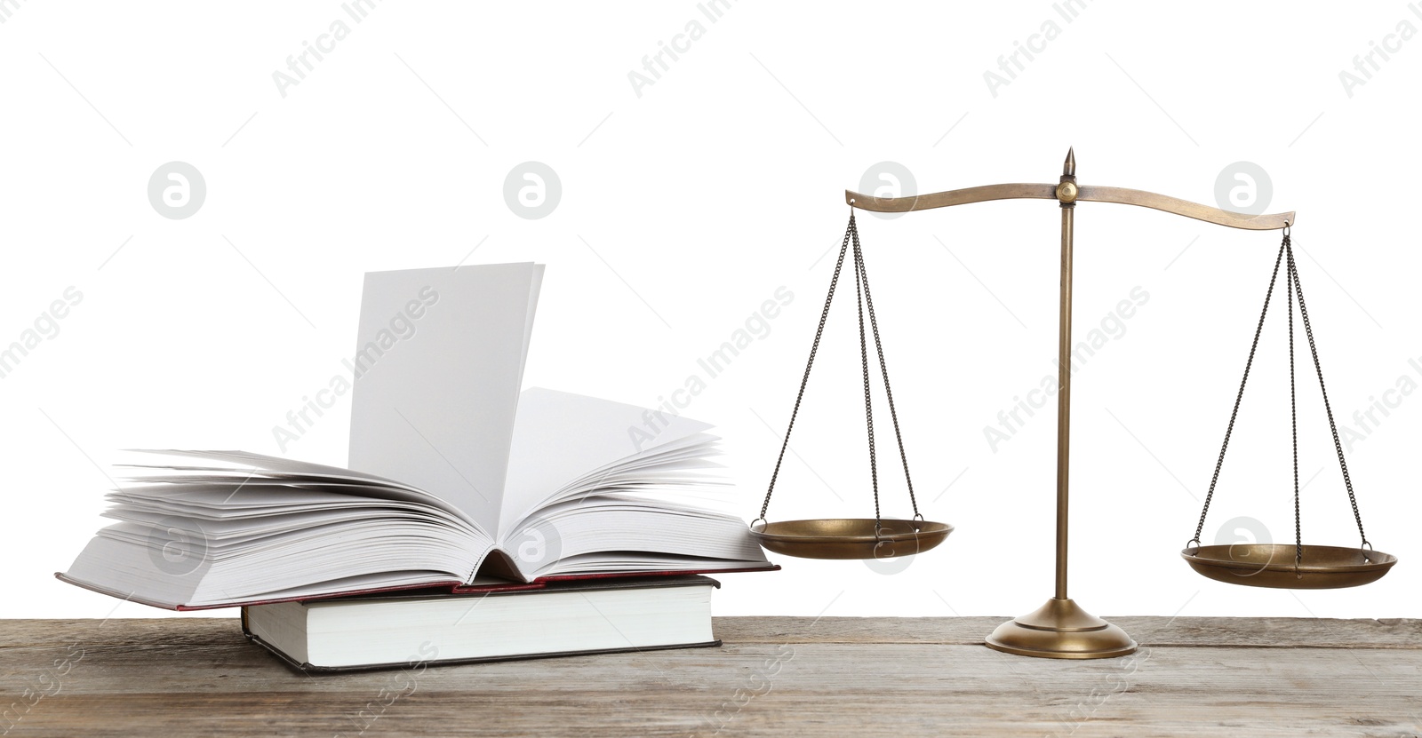 Golden scales of justice and books on wooden table against white background Photo of Golden scales of justice and books on wooden table against white background