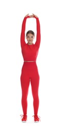 Photo of Teenage girl in sportswear stretching on white background