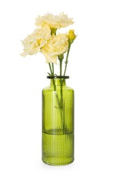 Photo of Beautiful eustoma flowers in glass vase isolated on white