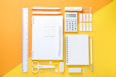 Photo of White stationery on color background, flat lay