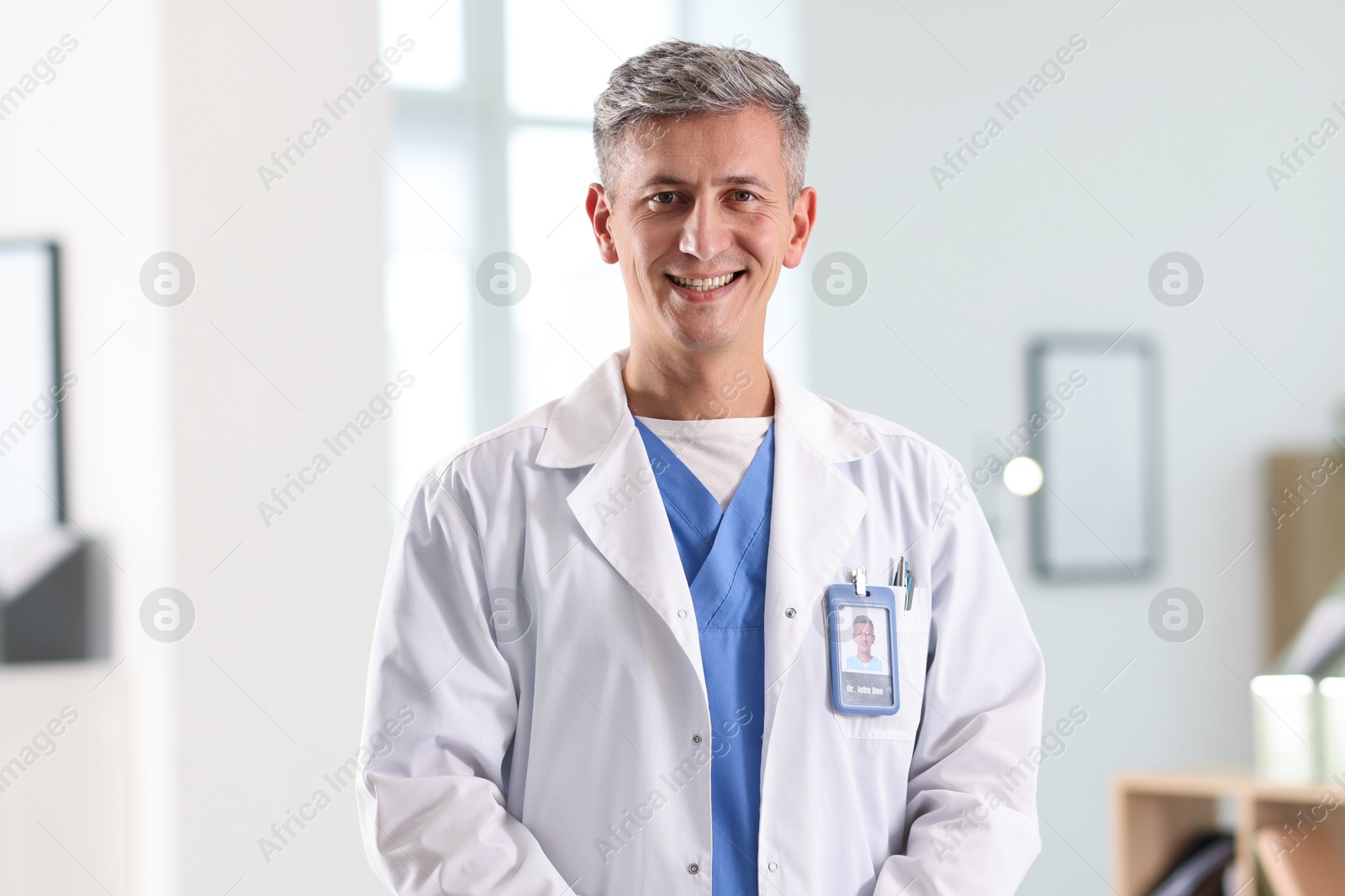 Portrait of doctor in white coat indoors Photo of Portrait of doctor in white coat indoors