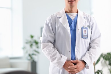 Photo of Doctor in white coat at clinic, closeup
