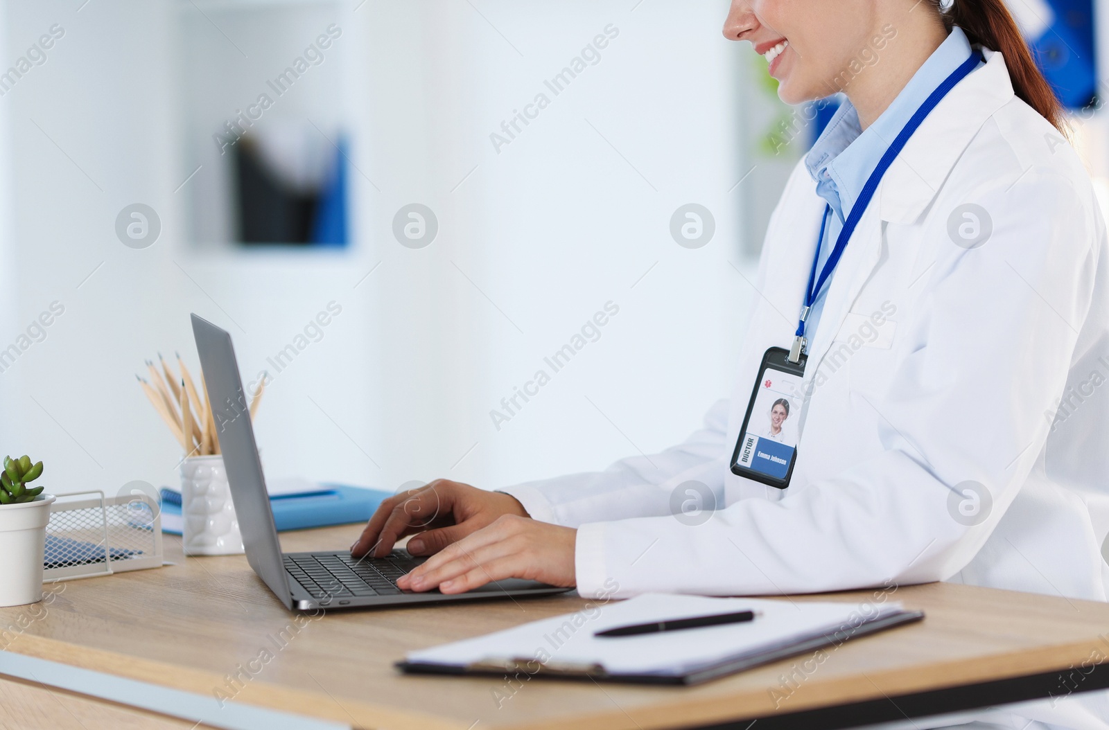 Telemedicine. Doctor having video call with patient via laptop indoors, closeup Photo of Telemedicine. Doctor having video call with patient via laptop indoors, closeup