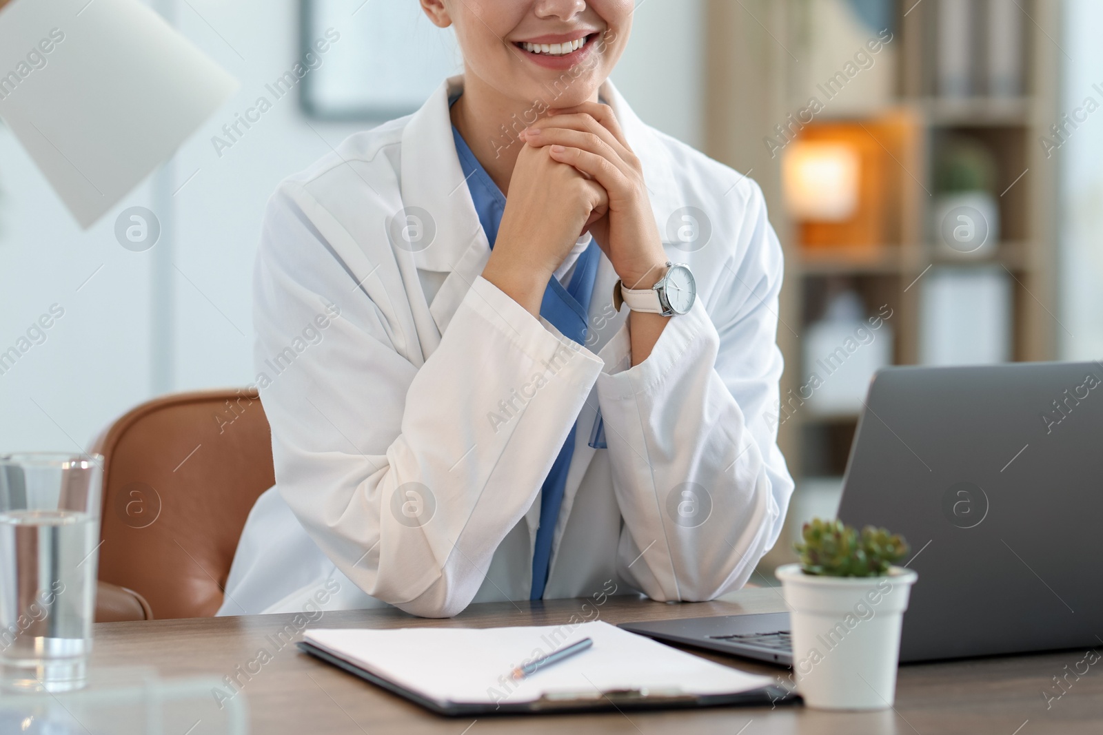 Telemedicine. Doctor having video call with patient via laptop indoors, closeup Photo of Telemedicine. Doctor having video call with patient via laptop indoors, closeup