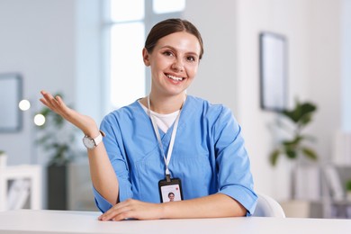 Photo of Telemedicine. Doctor having video call with patient, view from camera