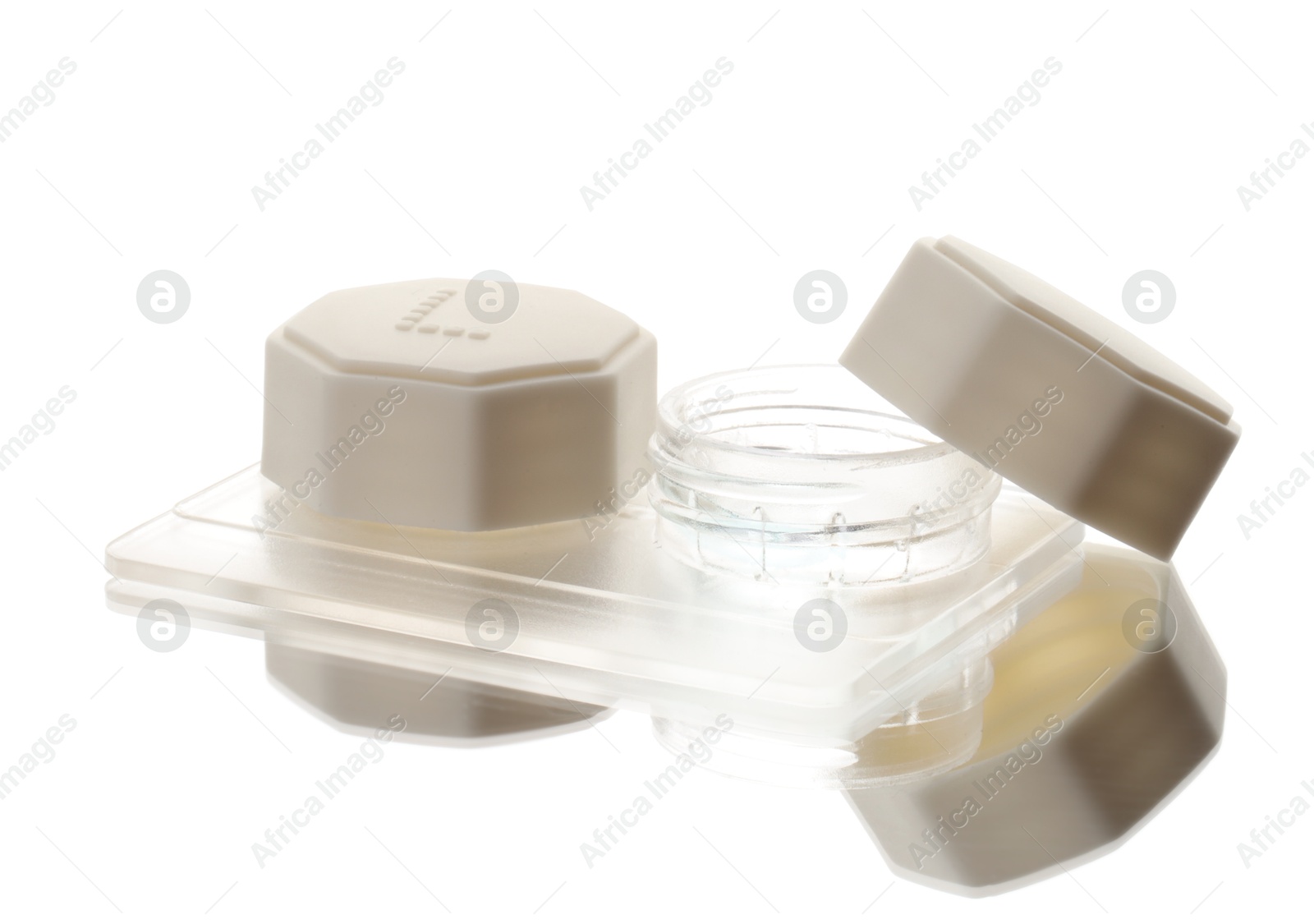Photo of Case with contact lenses isolated on white