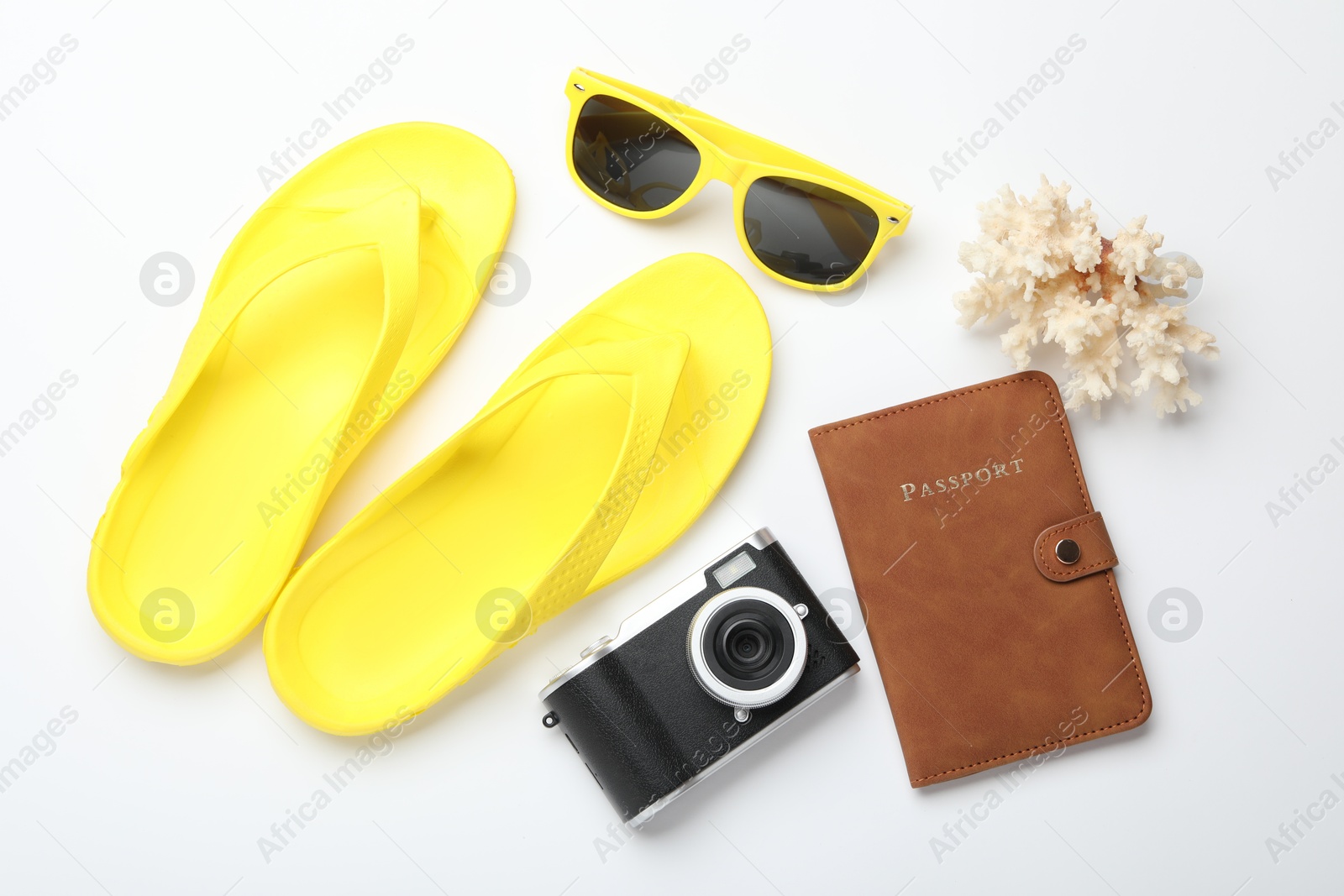 Photo of Time for summer vacation. Camera, passport and beach accessories on white background, flat lay