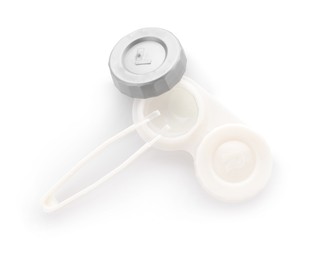 Photo of Case with contact lenses and tweezers isolated on white, top view