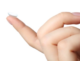 Photo of Woman with contact lens on white background, closeup