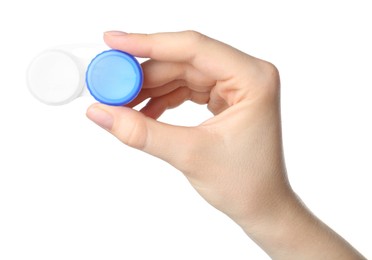 Photo of Woman holding case with contact lenses on white background, closeup