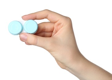Photo of Woman holding case with contact lenses on white background, closeup