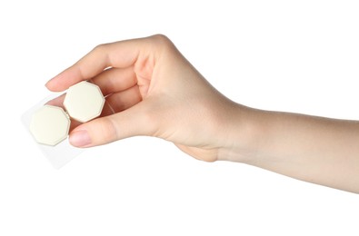 Photo of Woman holding case with contact lenses on white background, closeup