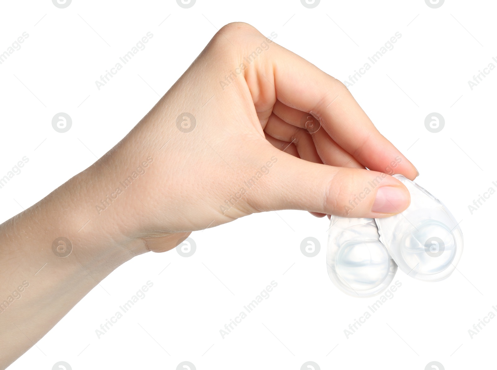 Woman holding blister packs with contact lenses on white background, closeup Photo of Woman holding blister packs with contact lenses on white background, closeup