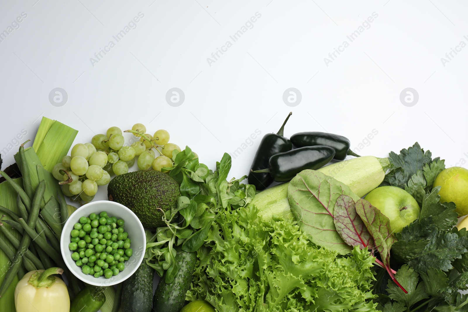 Superfood. Healthy food products on white background, top view Photo of Superfood. Healthy food products on white background, top view