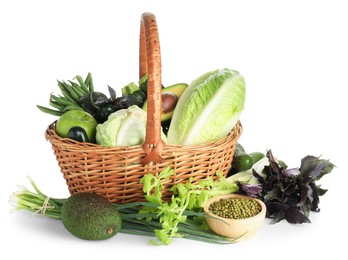 Photo of Superfood. Healthy food products in wicker basket isolated on white