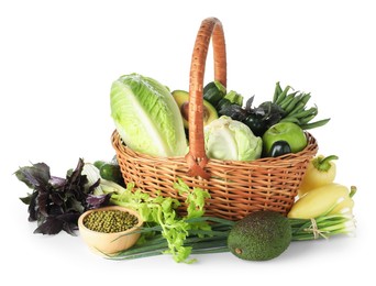 Photo of Superfood. Healthy food products in wicker basket isolated on white