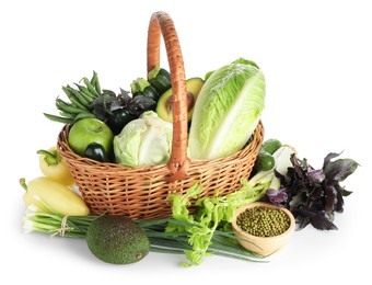 Photo of Superfood. Healthy food products in wicker basket isolated on white