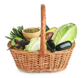 Photo of Superfood. Healthy food products in wicker basket isolated on white
