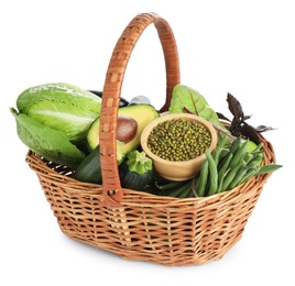 Photo of Superfood. Healthy food products in wicker basket isolated on white