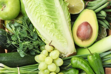 Photo of Superfood. Healthy food products in crate, top view