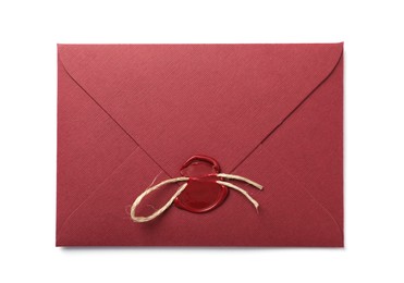 Photo of Envelope with wax seal and twine isolated on white, top view