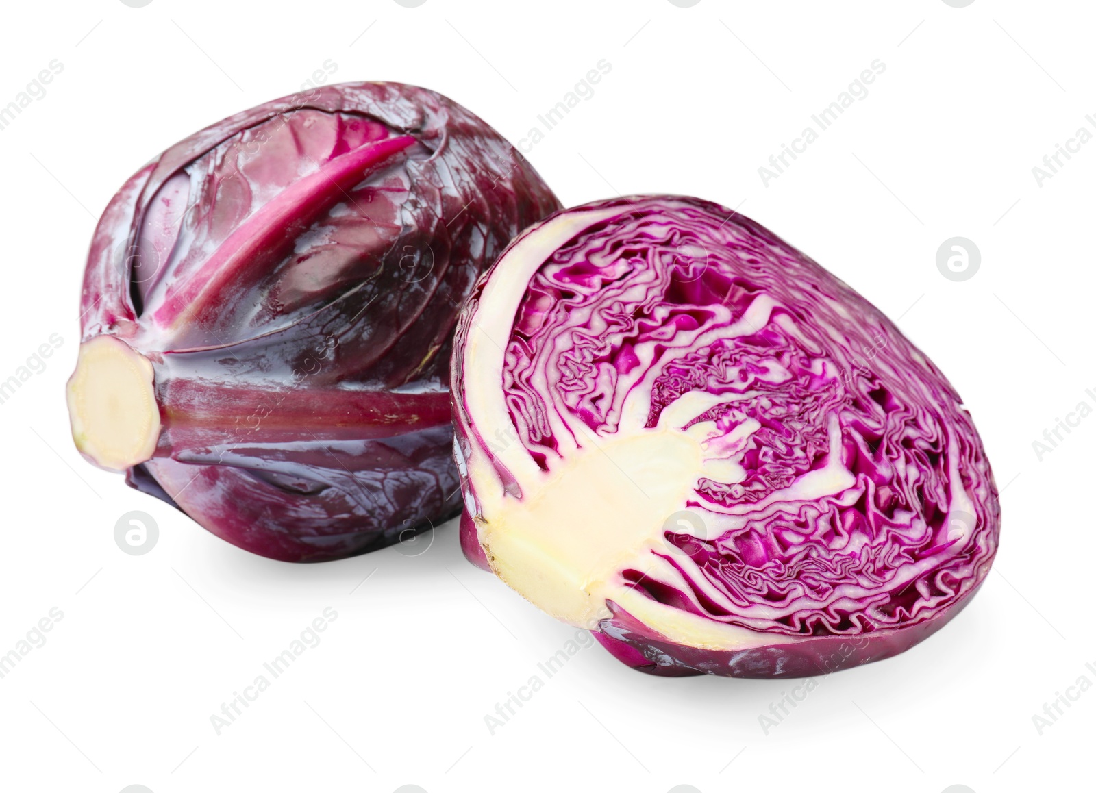 Whole and half of red cabbages isolated on white Photo of Whole and half of red cabbages isolated on white