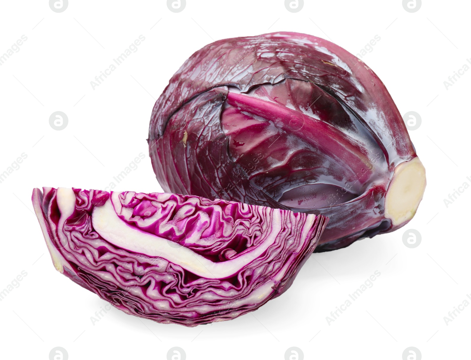 Whole and cut red cabbages isolated on white Photo of Whole and cut red cabbages isolated on white