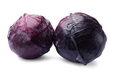 Photo of Heads of fresh red cabbage isolated on white