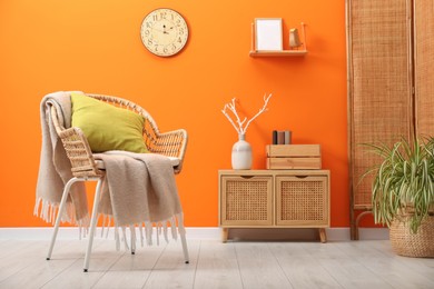 Photo of Comfortable armchair in living room. Interior design