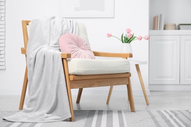 Photo of Comfortable armchair in living room. Interior design