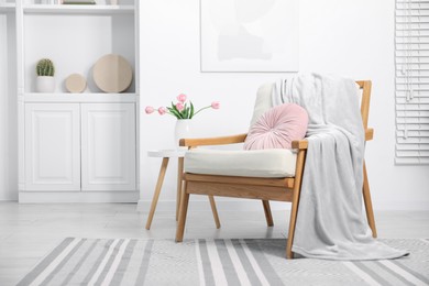 Photo of Comfortable armchair in living room. Interior design