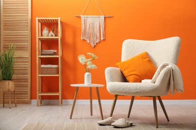 Photo of Comfortable armchair in living room. Interior design