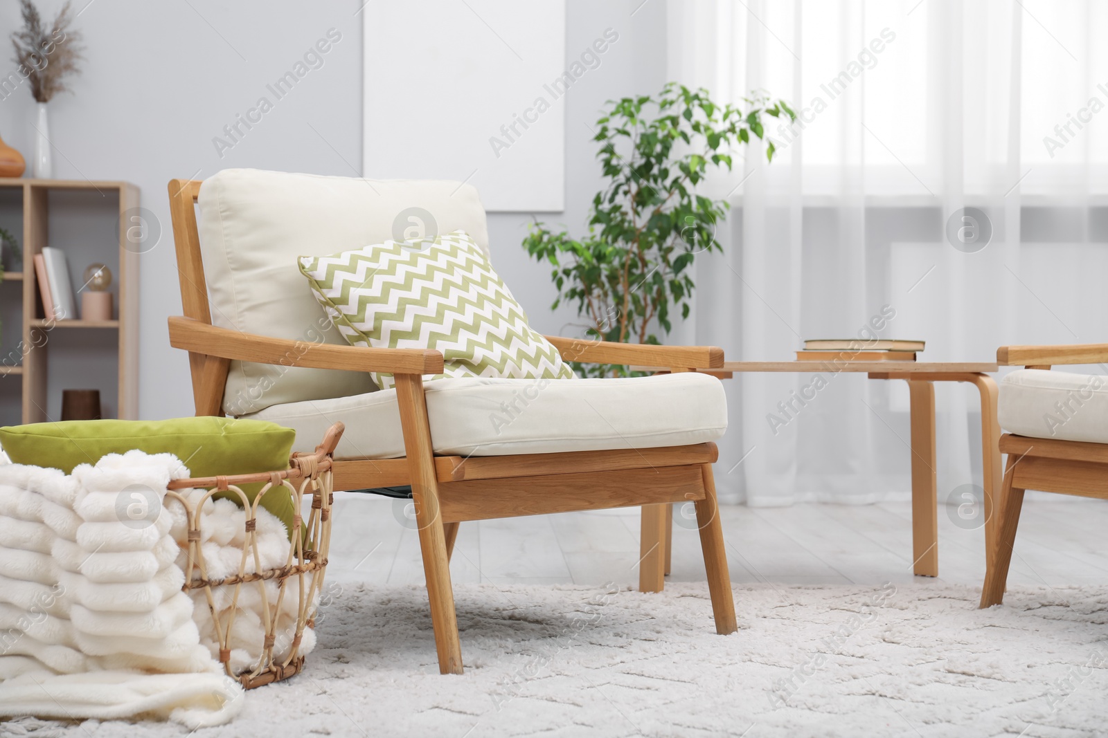 Comfortable armchairs and other furniture in living room. Interior design Photo of Comfortable armchairs and other furniture in living room. Interior design