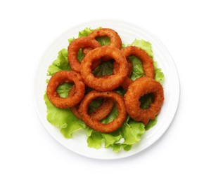 Photo of Fried squid rings and lettuce isolated on white, top view