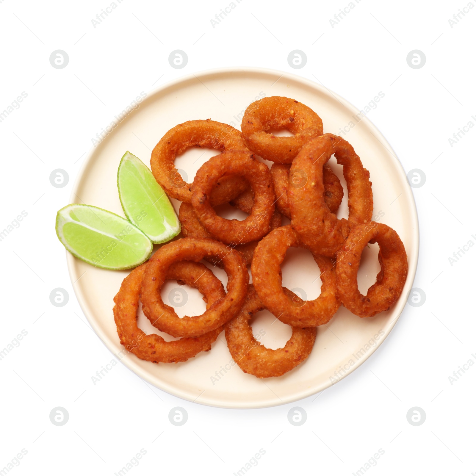 Fried squid rings and lime isolated on white, top view Photo of Fried squid rings and lime isolated on white, top view