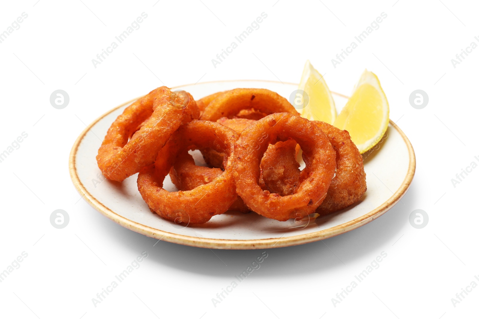 Fried squid rings and lemon isolated on white Photo of Fried squid rings and lemon isolated on white