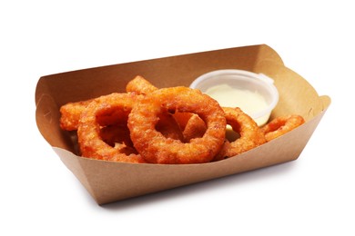 Photo of Fried squid rings and sauce in cardboard box isolated on white