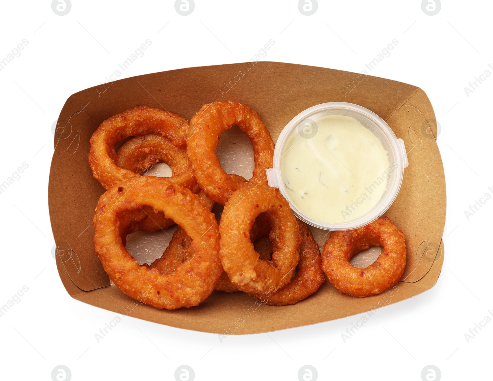 Fried squid rings and sauce in cardboard box isolated on white, top view Photo of Fried squid rings and sauce in cardboard box isolated on white, top view