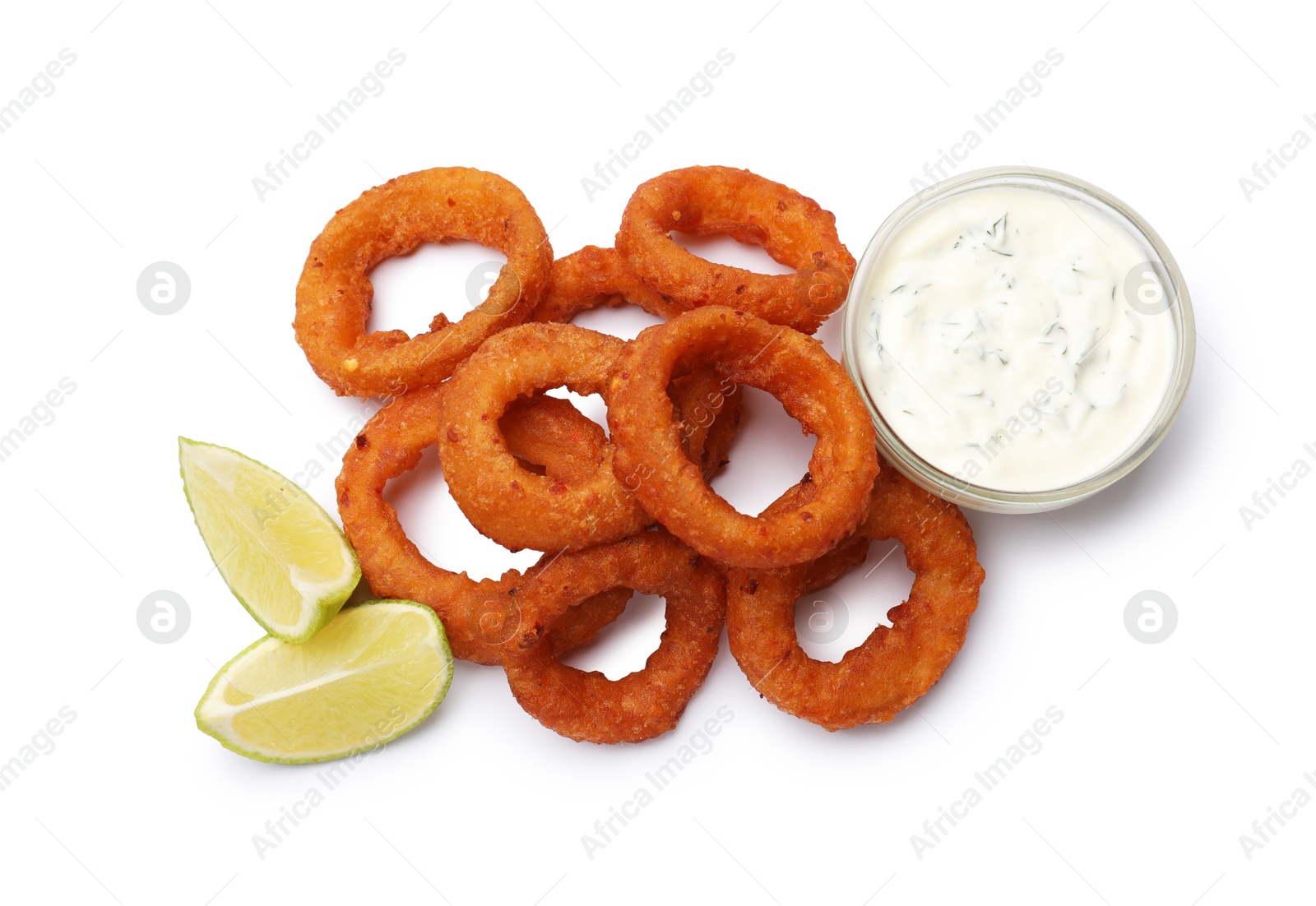 Fried squid rings, lime and sauce isolated on white, top view Photo of Fried squid rings, lime and sauce isolated on white, top view