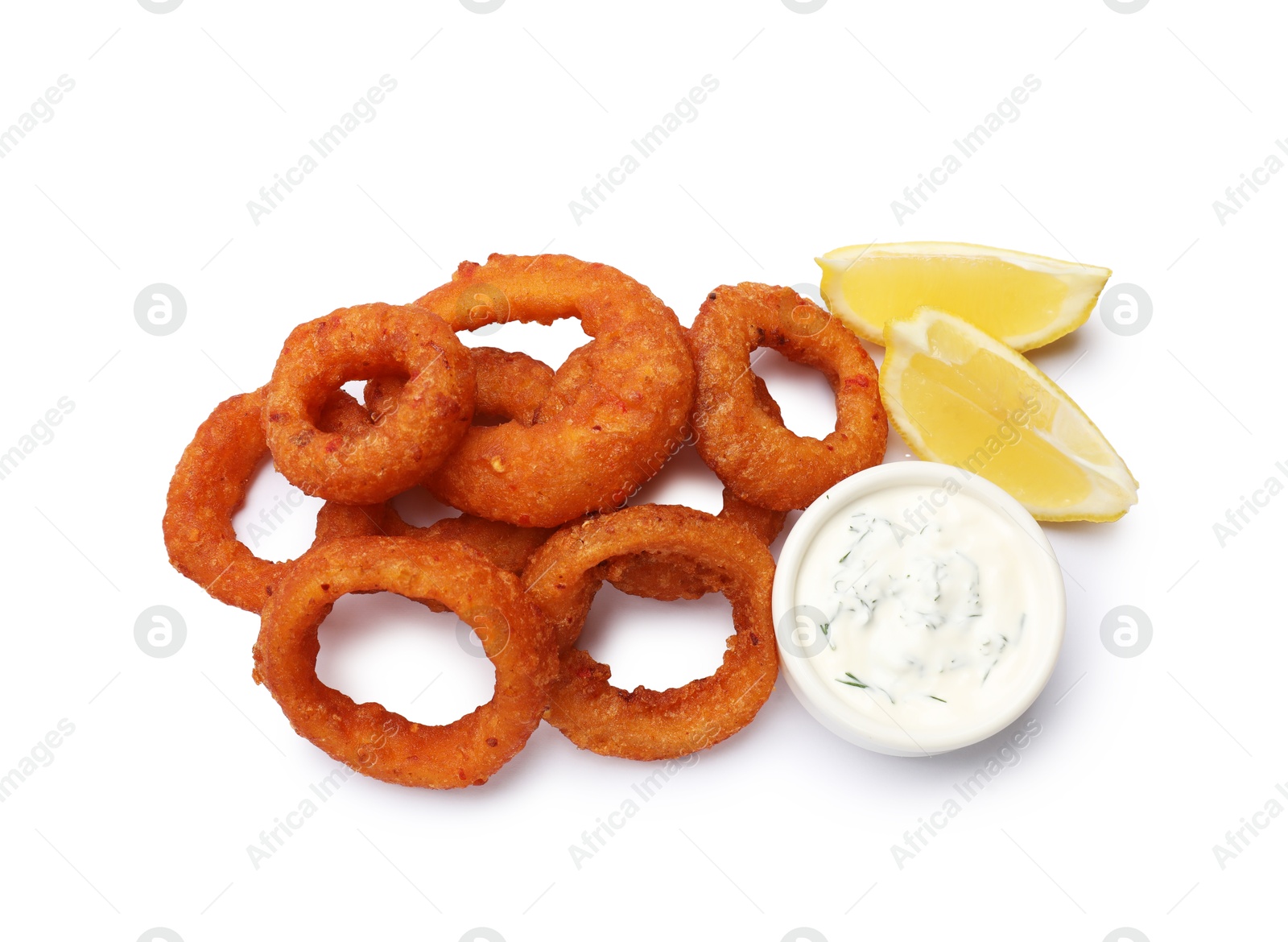 Fried squid rings, lemon and sauce isolated on white, top view Photo of Fried squid rings, lemon and sauce isolated on white, top view