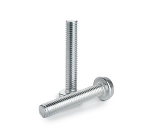 Photo of Two metal bolts isolated on white. Hardware tool
