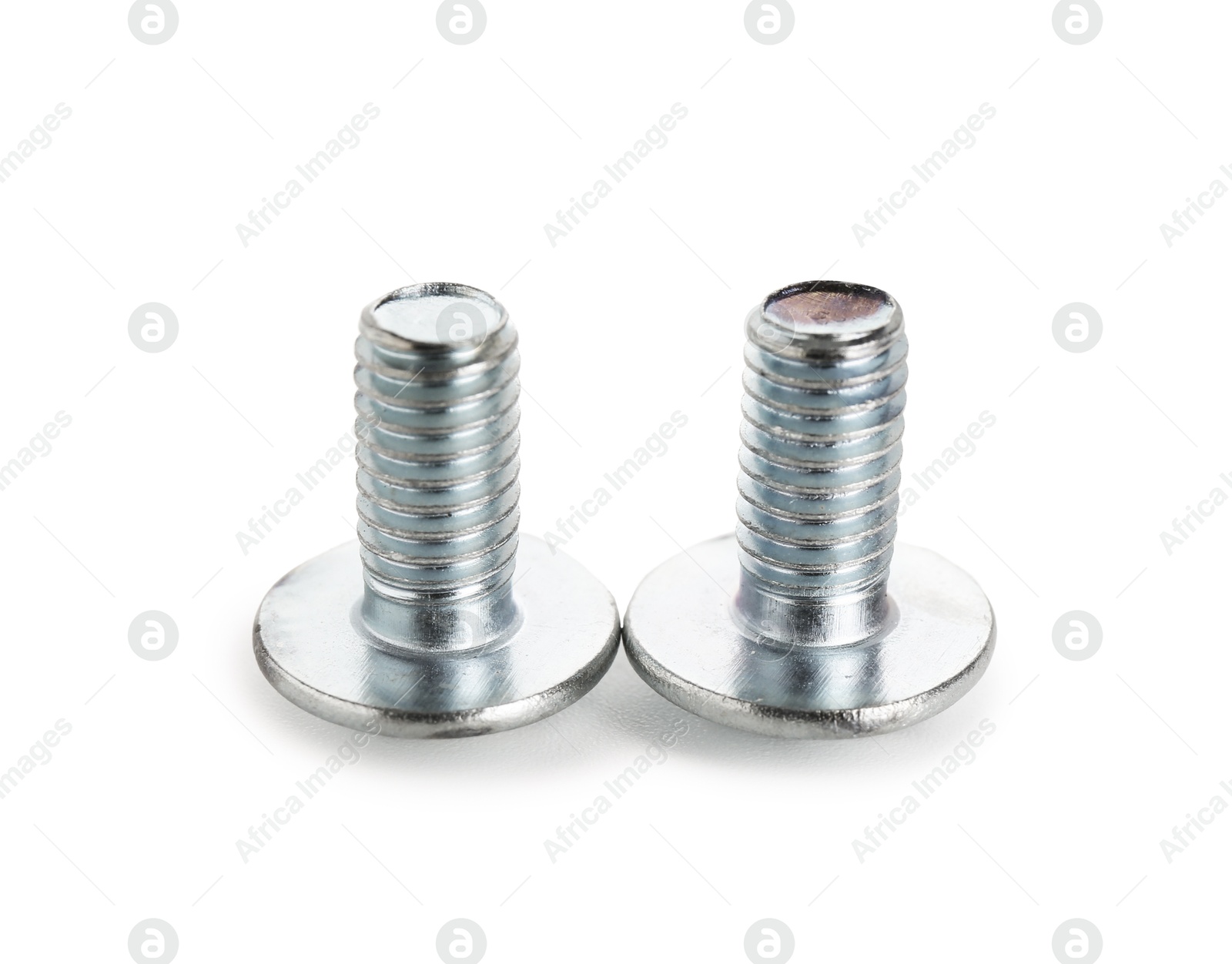 Two metal bolts isolated on white. Hardware tool Photo of Two metal bolts isolated on white. Hardware tool