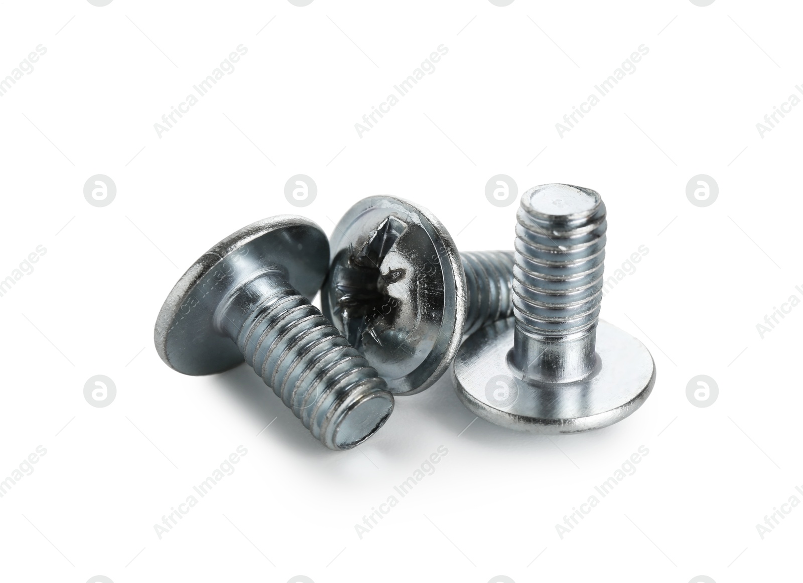 Three metal bolts isolated on white. Hardware tool Photo of Three metal bolts isolated on white. Hardware tool