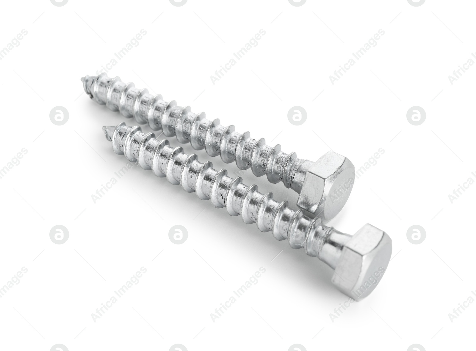 Two metal bolts isolated on white. Hardware tool Photo of Two metal bolts isolated on white. Hardware tool