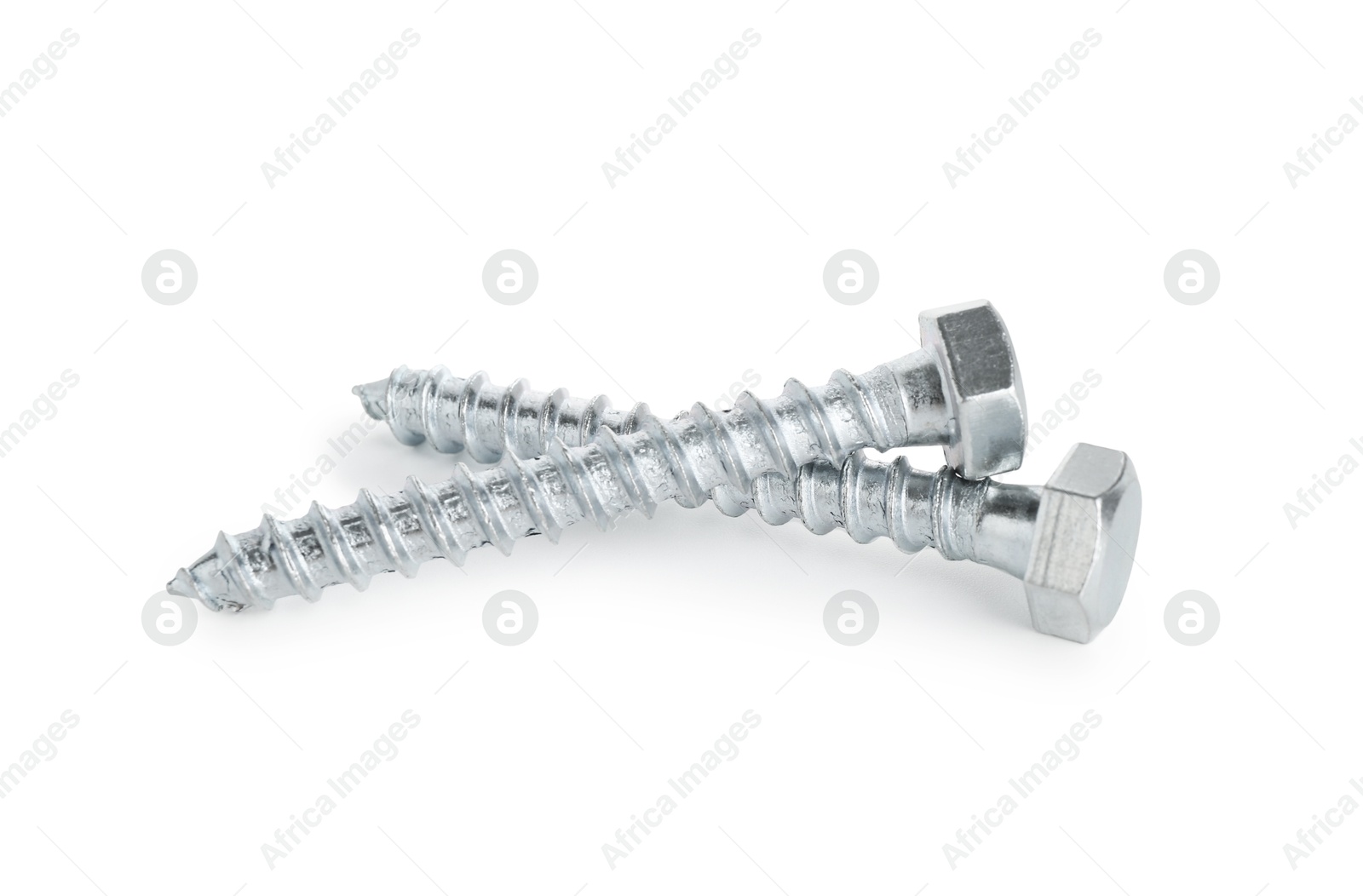 Two metal bolts isolated on white. Hardware tool Photo of Two metal bolts isolated on white. Hardware tool